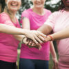 women fighting breast cancer scaled 1